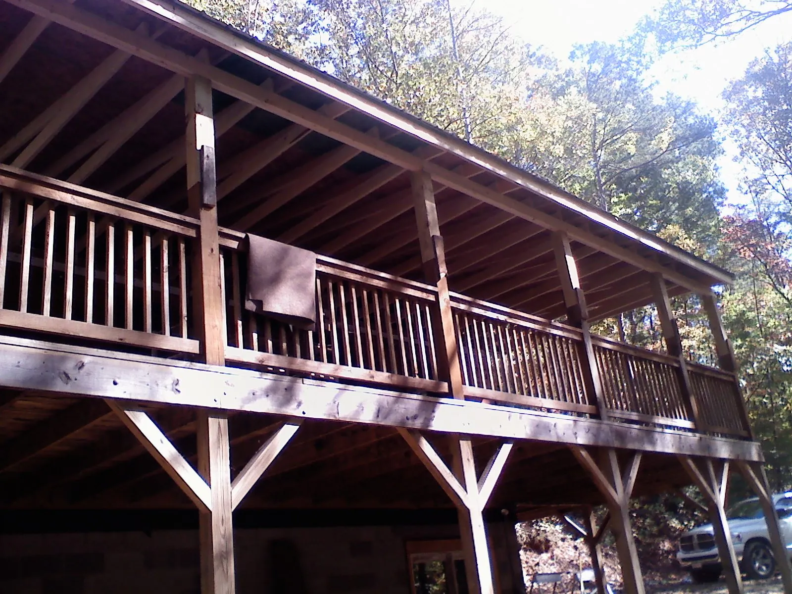 Timber framing under a new elevated porch and deck — Roof Leak Repair in Midway City by Roofing Brothers
